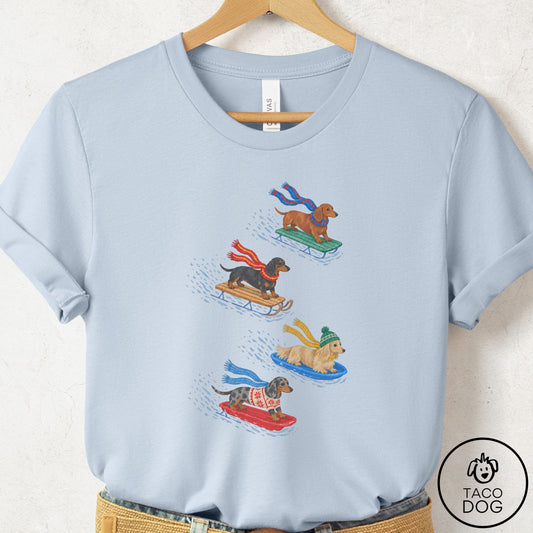 Dachshund Sledding T-Shirt Light Blue Taco-Dog