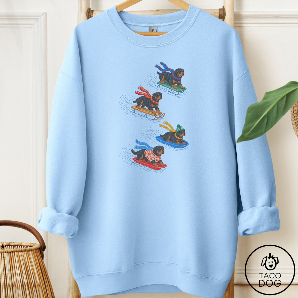 Rottweiler Sledding Sweatshirt Light Blue Taco-Dog