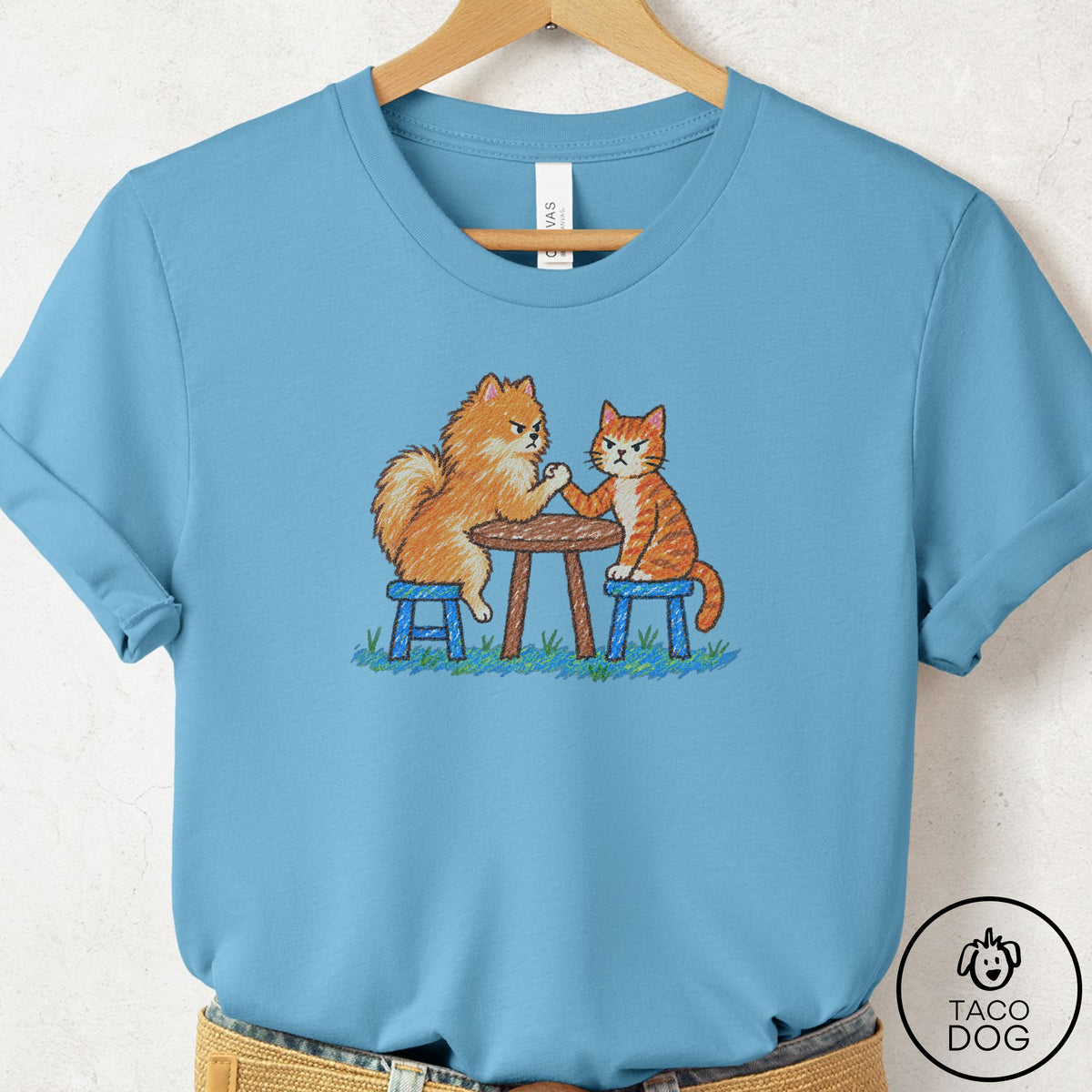 Pomeranian Arm Wrestling T-Shirt Ocean Blue Taco-Dog