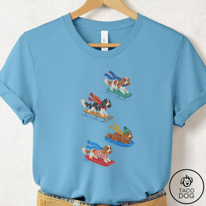 Cavalier King Charles Spaniel Sledding T-Shirt Ocean Blue Taco-Dog