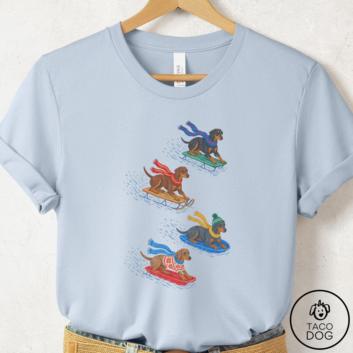 Doberman Sledding T-Shirt Light Blue Taco-Dog