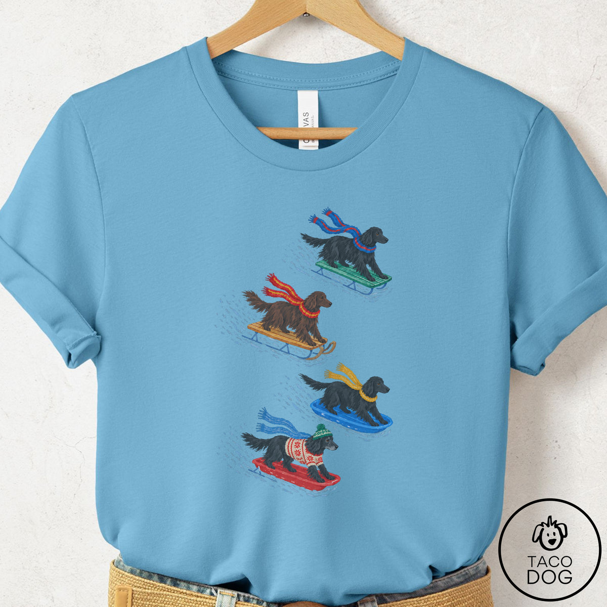 Flat-Coated Retriever Sledding T-Shirt Ocean Blue Taco-Dog