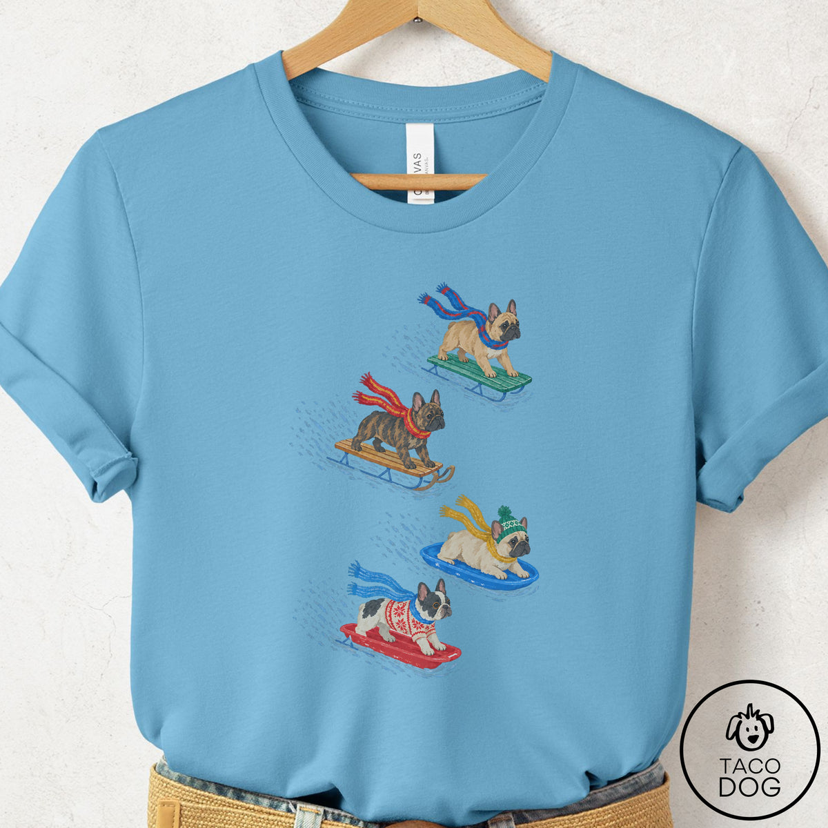 French Bulldog Frenchie Sledding T-Shirt Ocean Blue Taco-Dog
