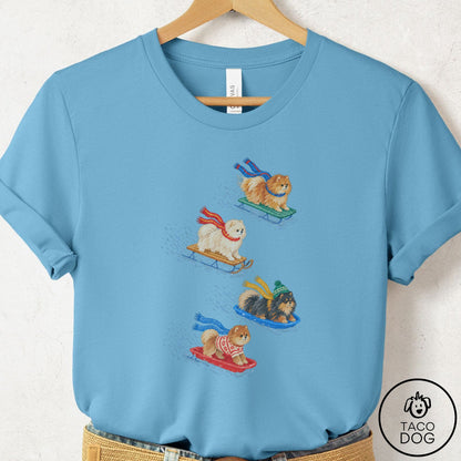 Pomeranian Sledding T-Shirt Ocean Blue Taco-Dog