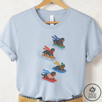 Rottweiler Sledding T-Shirt Light Blue Taco-Dog