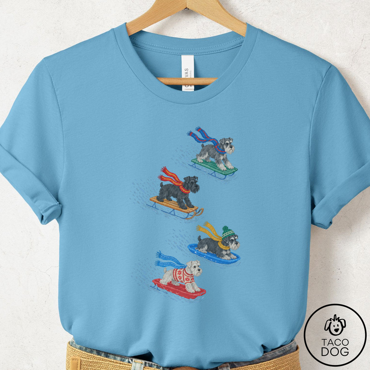 Schnauzer Sledding T-Shirt Ocean Blue Taco-Dog