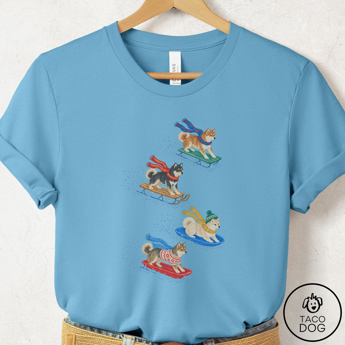Shiba Inu Sledding T-Shirt Ocean Blue Taco-Dog
