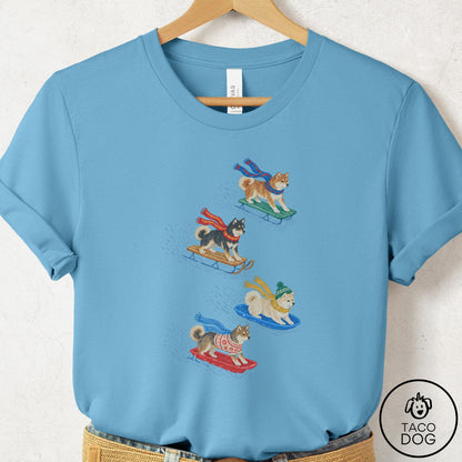 Shiba Inu Sledding T-Shirt Ocean Blue Taco-Dog
