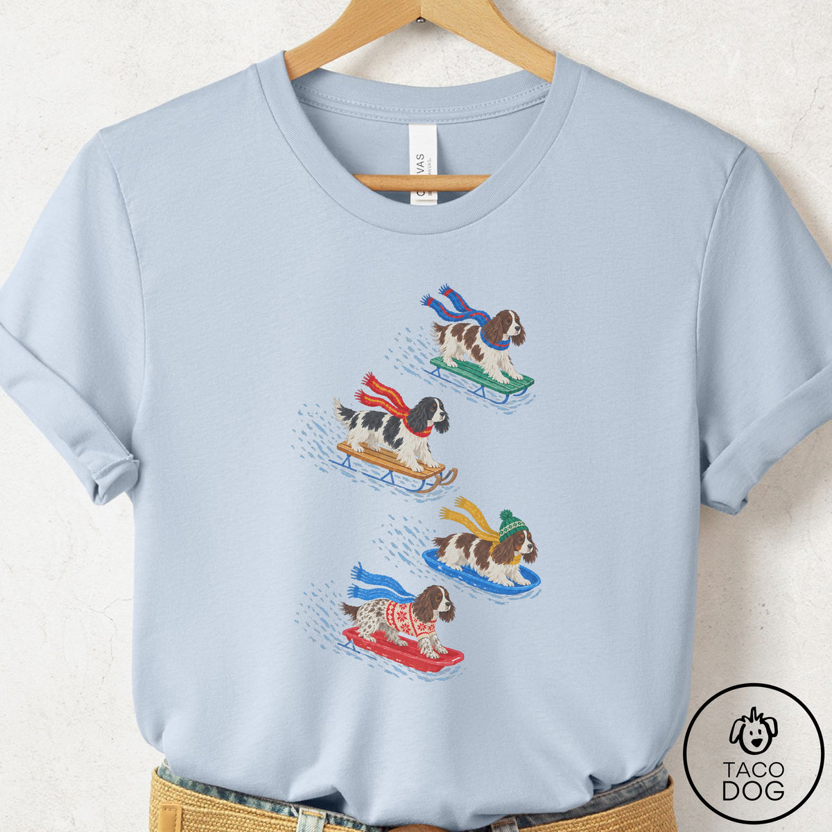 Springer Spaniel Sledding T-Shirt Light Blue Taco-Dog
